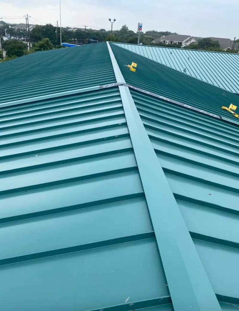 Green commercial metal roof ridge and valley for Metal Roof Repair in Cedar Mill
